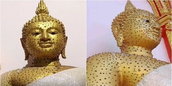 พระพุทธรูปมีตุ่มขึ้น -"The Buddha statue has a bump."
